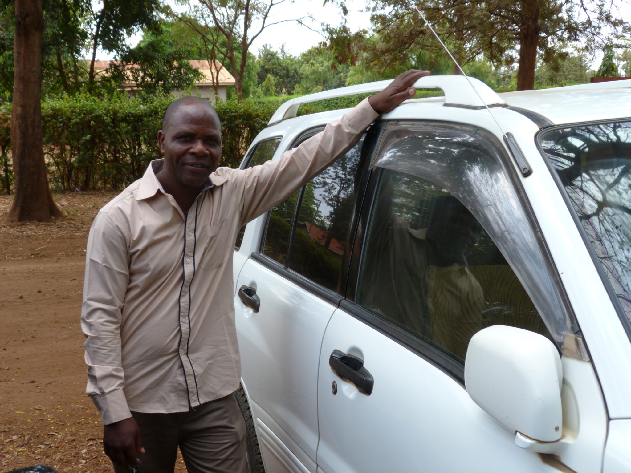 AfricAid's dependable driver, Oscar Changelela, ready to transport the Kisa Mentors to their daily classes.